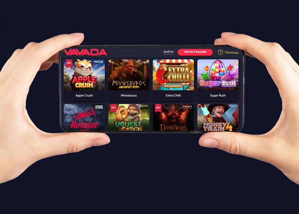Руки користувача тримають смартфон з активними слот-іграми в казино Vavada